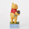 Disney : Winnie l'Ourson - Traditions - Figurine Winnie & Trèfles "Lucky Ol' Bear"