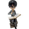 Harry Potter - Figurine Harry Pile de Grimoires